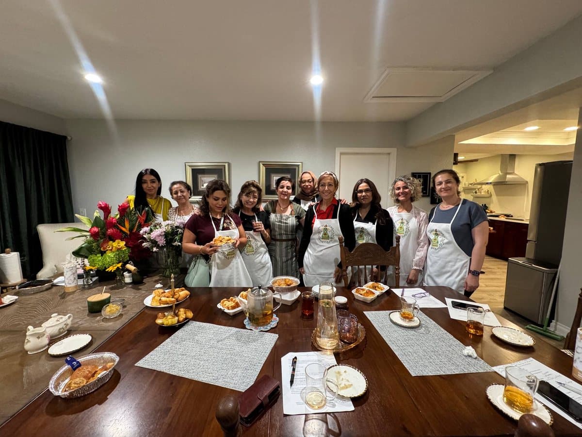 The whole table together at the end of a Danish pastry workshop